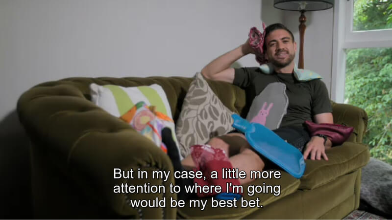 image of man on couch with captioning