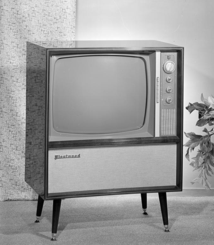 A black and white photograph of a TV